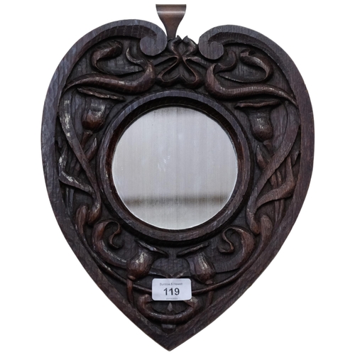 119 - A stylised Arts and Crafts heart-shaped wall mirror, with stylised decoration, L34cm