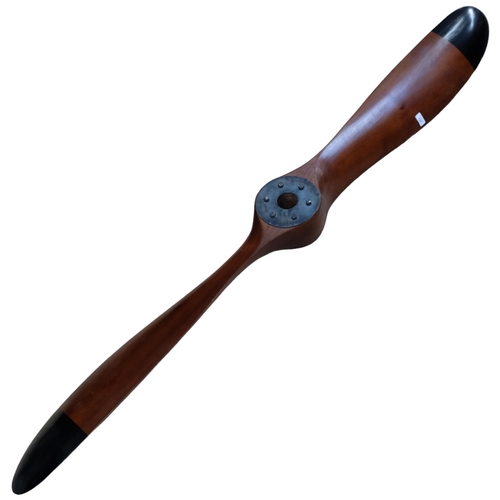 121 - A large stained wood propeller, L197cm