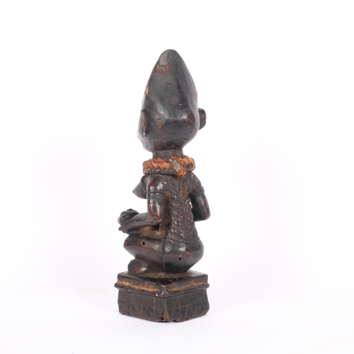 13 - An African Congolese Yombe Tribal carved wood maternity figure, H31cm