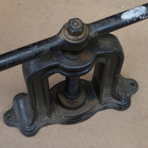130 - A Victorian cast-iron press, closed height 39cm, overall width 56cm