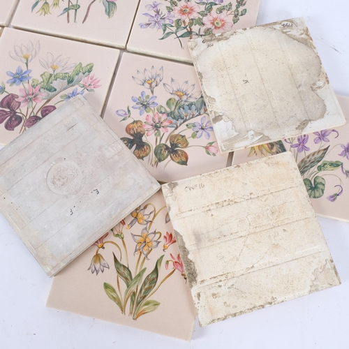 141 - A box of 11 hand painted floral tiles, and 1 other