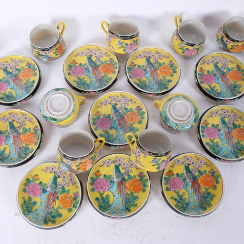 158 - A set of 12 x 20th century eggshell cups and saucers, with hand painted enamelled floral decoration