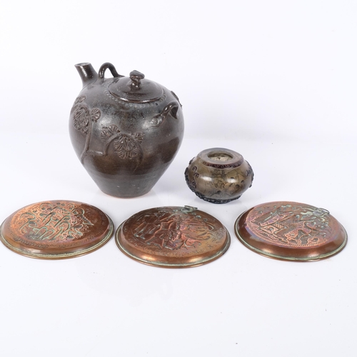 168 - A brown glazed pottery teapot, a group of 3 Middle Eastern copper embossed dishes, and a Chinese int... 
