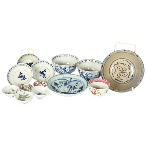 170 - A group of Chinese blue and white bowls, and dish, an enamel tea bowl, etc