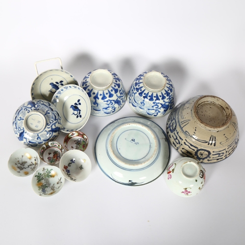 170 - A group of Chinese blue and white bowls, and dish, an enamel tea bowl, etc