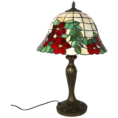 180 - A Tiffany style coloured leadlight table lamp and shade, overall height 57cm