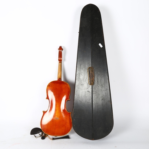 210 - A three-quarter-size wooden violin, in associated wooden hardshell case, no bow, violin back length ... 