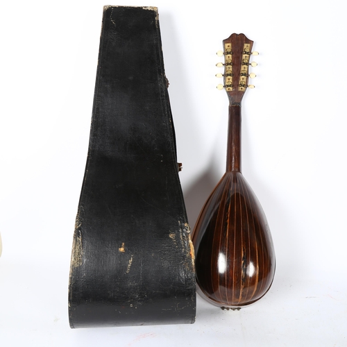 218 - A rosewood barrel-back mandolin, with maker's label inside reading 