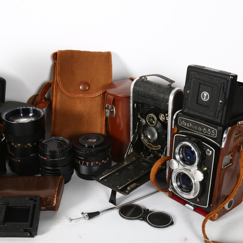 238 - A quantity of Vintage cameras and equipment, including an Olympus OM101 Power Focus, a Praktica LB, ... 