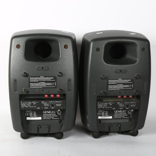 242 - GENELEC - a pair of Genelec 8040A bi-amplified monitoring system speakers, serial nos. PH7001700 and... 