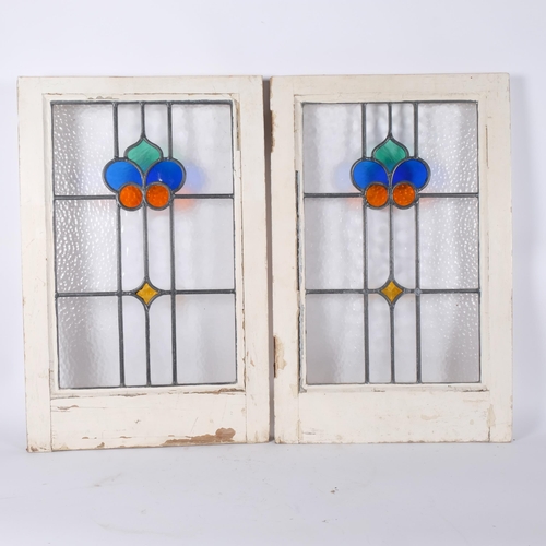 25 - A pair of early 20th century coloured leadlight window frames, 70cm x 45cm overall, rebate 55cm x 35... 
