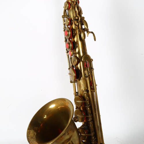 254 - An unmarked brass alto saxophone, in associated carry case, no maker's marks