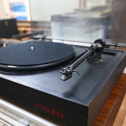 255 - A Systemdek II turntable, and a Toshiba stereo receiver, model SA-320L, comes with purchase guarante... 