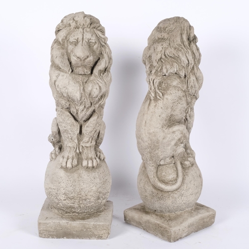 30 - A pair of concrete seated lions, on ball finials and square bases, H46cm