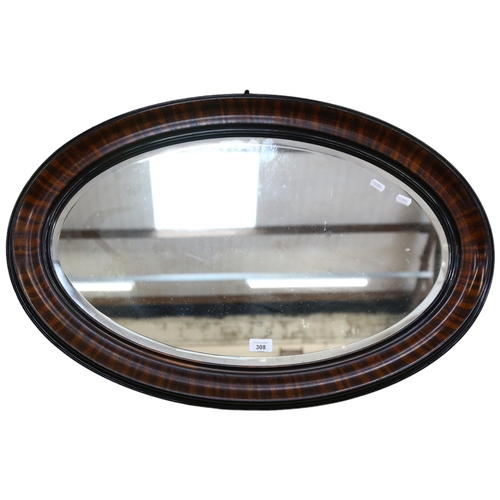 308 - A large oval mahogany-framed mirror, bevelled glass, approx 53cm x 80cm