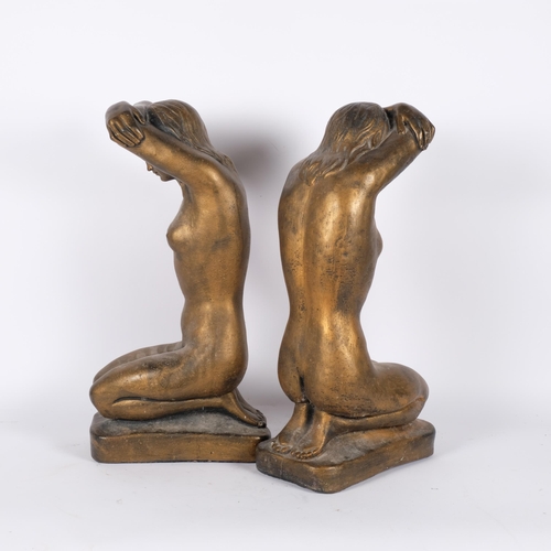 32 - A pair of composite gilded kneeling female figures, H50cm