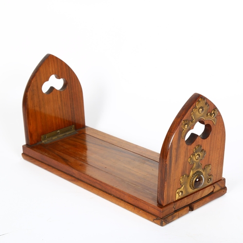 338 - Antique patent walnut extending table-top bookrack, with inset stones and brass mounts, L30cm