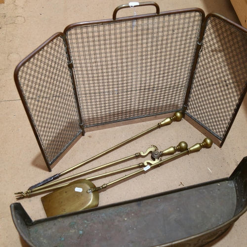 422 - A 3-piece long-handled brass fire iron set, a brass mesh triple spark guard, and a fender