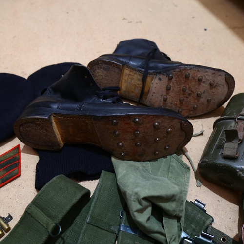 423 - Various Second World War items, including beret, boots, leather-cased binoculars etc