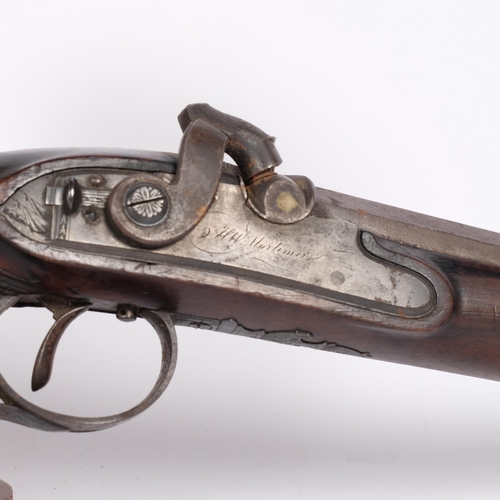 44 - An 18th century percussion pistol, with walnut diamond engraved handle and fitted barrel cleaner, na... 