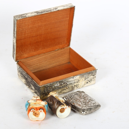 445 - An Oriental antimony box with embossed decoration, floral white metal embossed Vesta, and a pair of ... 