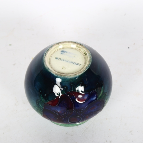 451 - MOORCROFT - a small anemone decorated tube-lined pot, H7cm