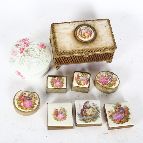 469 - A group of Limoges ceramic and gilt-metal boxes and casket (9)