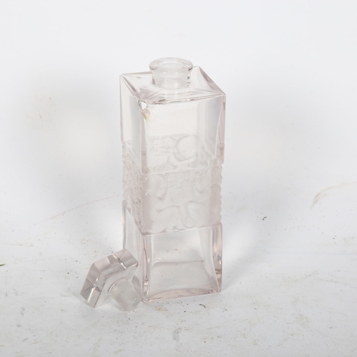 487 - R LALIQUE FRANCE - a rectangular scent bottle and stopper, having a moulded child and tree design ce... 