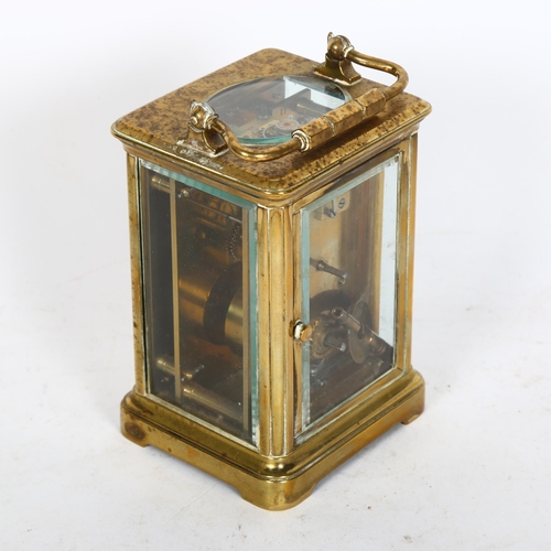 510 - A French brass-cased 8-day carriage clock, with gilded dial, height not including handle 12cm, compl... 