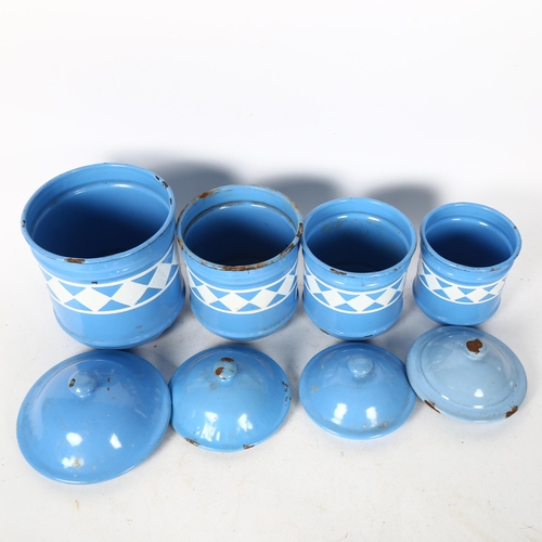 557 - A graduated set of Vintage French enamel kitchen canisters, largest height 18cm