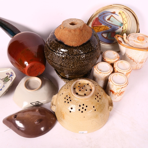 571 - A large collection of mid-century Studio pottery, including an Alfred Reed for Poole Pottery, a 1950... 