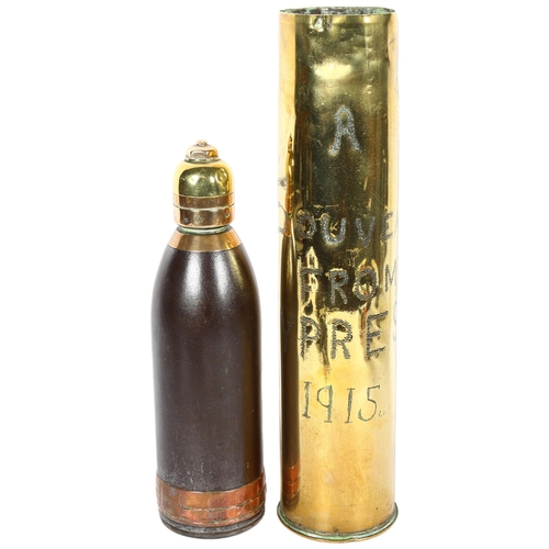 587 - A trench art Ypres 1915 shell case, 35cm, a (deactivated) hand grenade, and a shell converted to a c... 