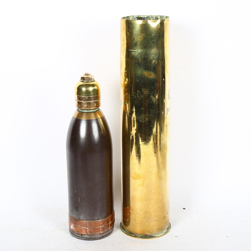 587 - A trench art Ypres 1915 shell case, 35cm, a (deactivated) hand grenade, and a shell converted to a c... 