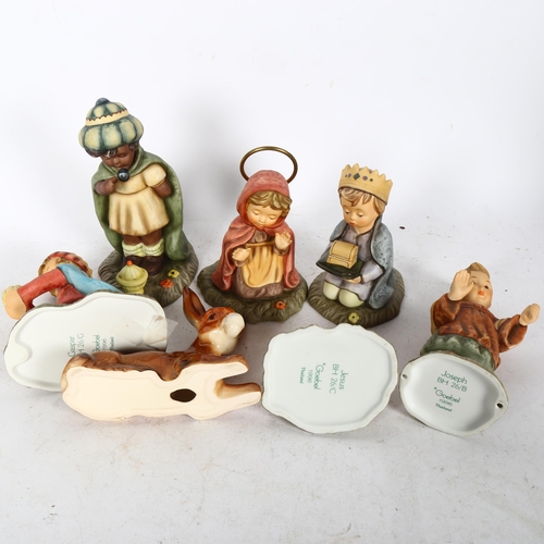 609 - A group of Goebels Nativity figures, tallest Melchoir 16cm (crack to base), and a porcelain donkey