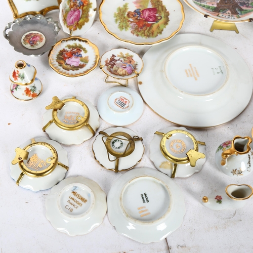 618 - A group of Limoges and other porcelain miniature ornaments, dishes etc