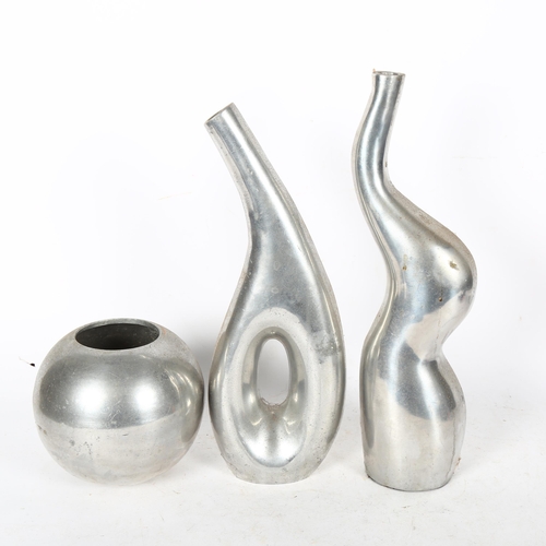 642 - Cast-aluminium sculptural vases, tallest 35cm, and a similar circular vase