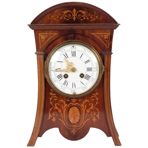 66 - An Art Nouveau mahogany and satinwood inlaid 8-day mantel clock, with enamelled dial, complete with ... 