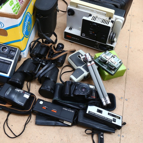 679 - A box of various cameras and cased binoculars, including Wray and Boots