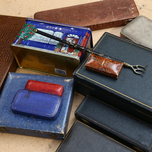 691 - Various cutlery boxes and cutlery, and a tin