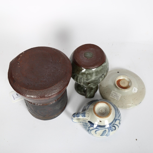 714 - 3 pieces of Studio pottery, Seth Cardew cup and saucer and a large Abuja pottery tankard, both with ... 