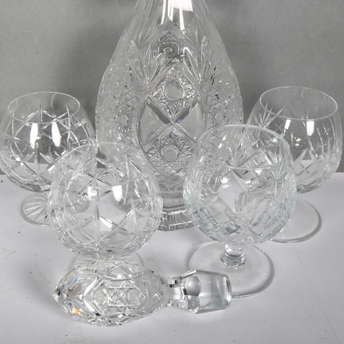 722 - A cut-glass crystal decanter, H38cm, with stopper, and 4 unassociated cut-glass Brandy balloons