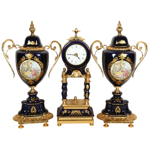 733 - A Limoges blue cobalt and gold gilt 3-piece clock garniture, centrepiece clock has 4 outer pillars, ... 