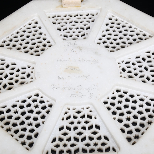 872 - An Indian alabaster octagonal table top, with pierced panels and inlaid lapis and hardstone floral m... 