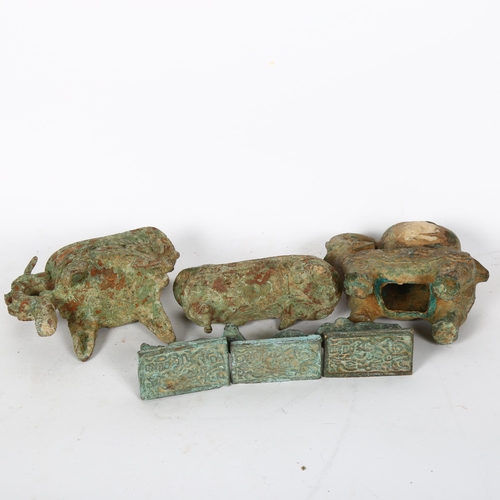 746 - A group of Archaic verdigris cast-metal sculptures, including an elephant with a water bucket, H13cm... 