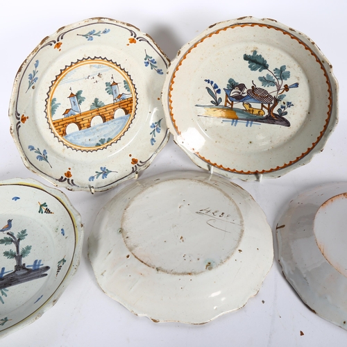 762 - 5 various faience tin-glazed earthenware shallow dishes, with painted designs, 22.5cm