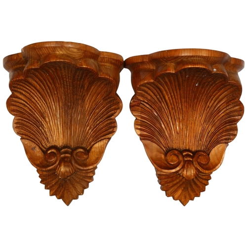 772 - A pair of carved pine wall brackets, H30cm