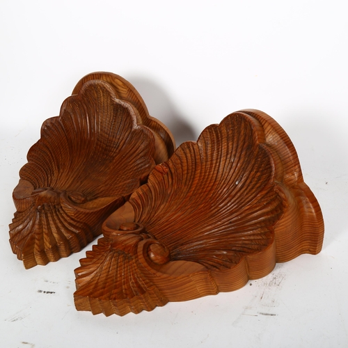 772 - A pair of carved pine wall brackets, H30cm