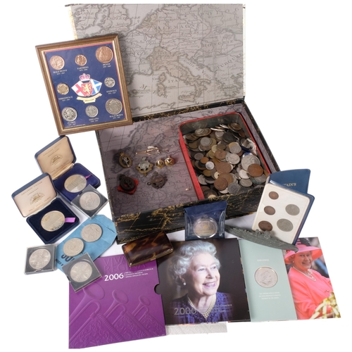 98 - A collection of English and worldwide pre-decimal coins, including commemorative cased items, a Quee... 