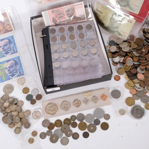 99 - A large collection of world coins and banknotes, including Chinese, USA etc