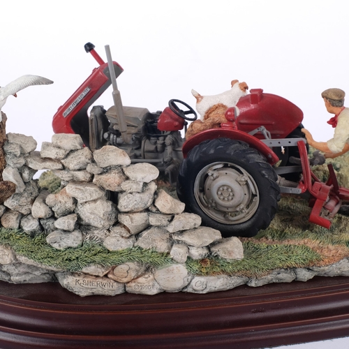 920 - A Country Artists sculpture of a man and Terriers with tractor 